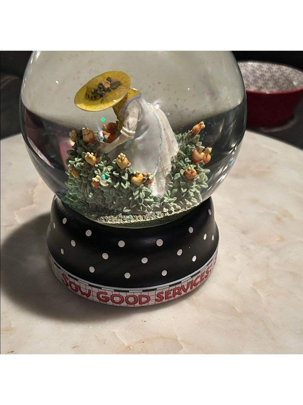 Michel Studio Snow Globe with Yellow Hat and Black Polka Dot Base